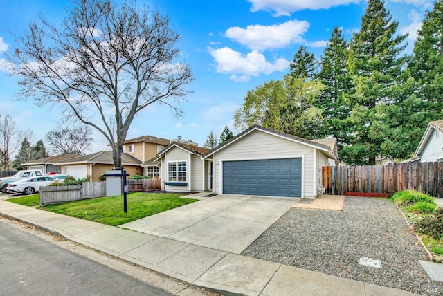 ranch-style house featuring a garage, driveway, a front yard, and fence