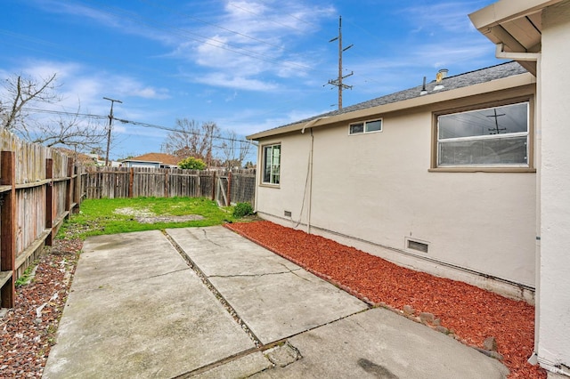 view of patio with a fenced backyard