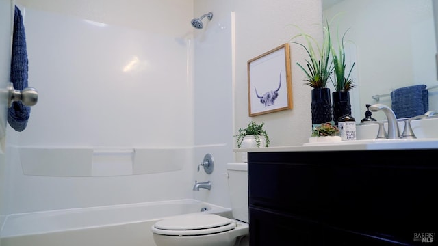 full bath with toilet, vanity, and shower / bathtub combination