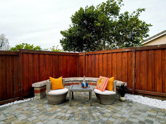 view of patio with a fenced backyard