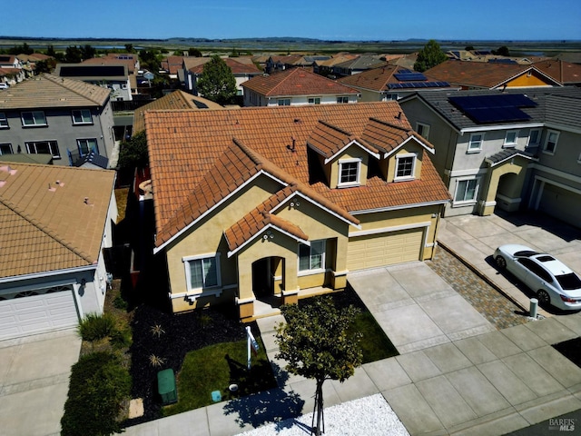 birds eye view of property with a residential view