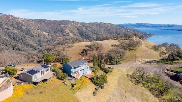 drone / aerial view featuring a mountain view