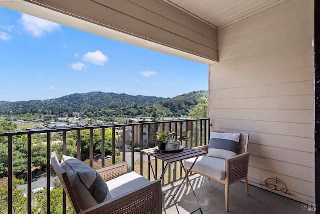 balcony featuring a mountain view