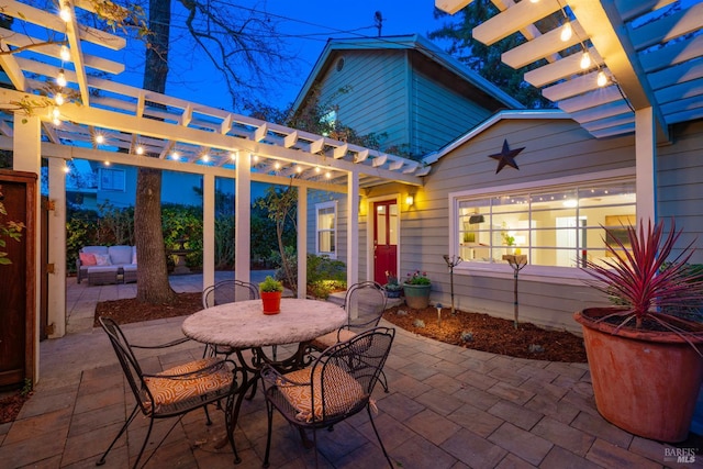 view of patio / terrace featuring outdoor dining area and a pergola