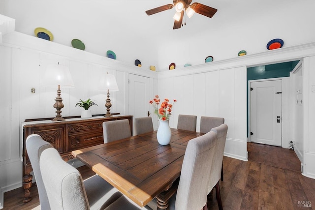 dining room with dark wood finished floors and ceiling fan