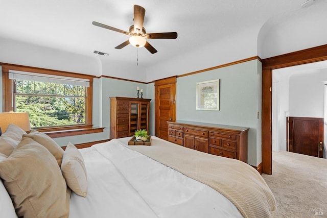 bedroom featuring carpet, visible vents, and ceiling fan