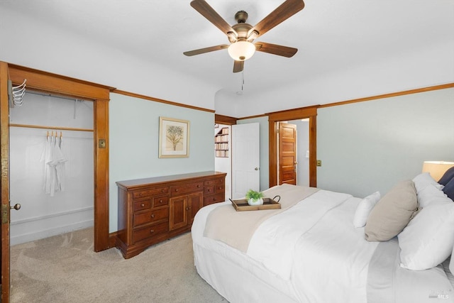 bedroom featuring light carpet and ceiling fan