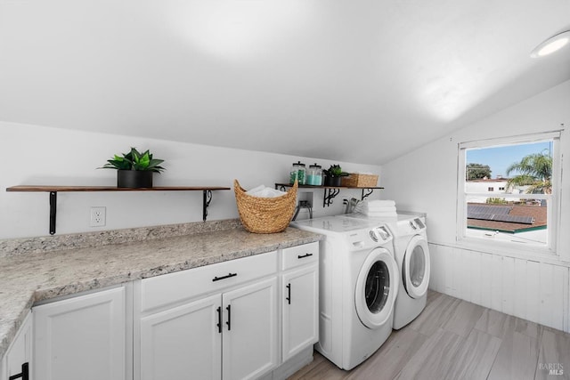 laundry area featuring cabinet space and washer and dryer