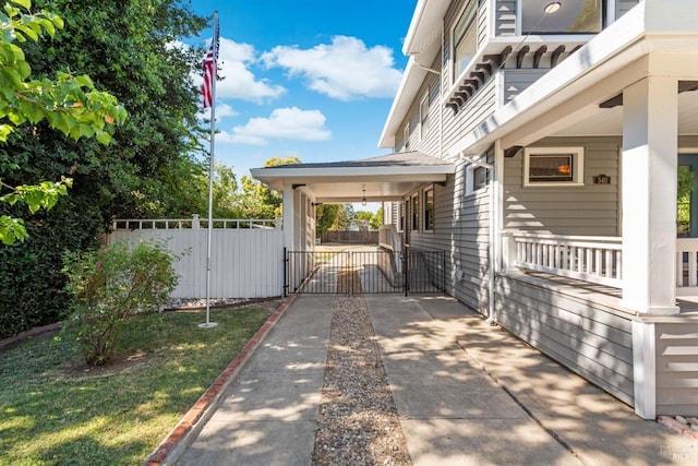 exterior space featuring a gate and fence