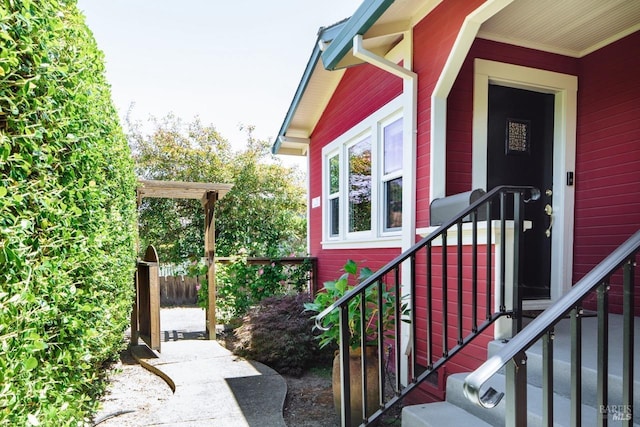 property entrance with fence