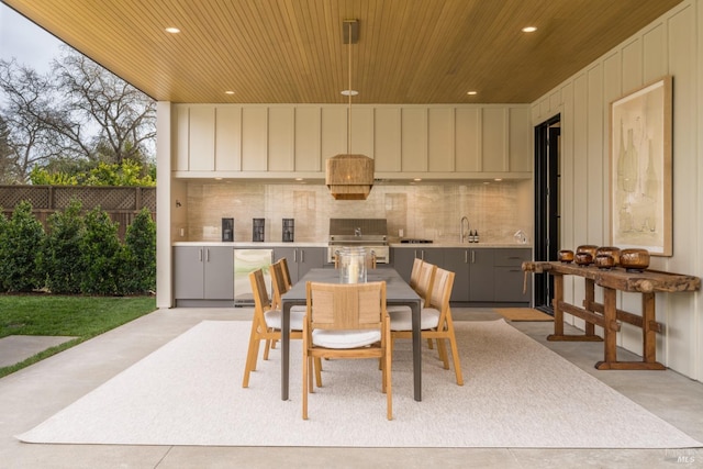 dining room with wooden ceiling and recessed lighting