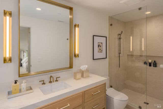 ensuite bathroom featuring recessed lighting, toilet, an enclosed shower, connected bathroom, and vanity