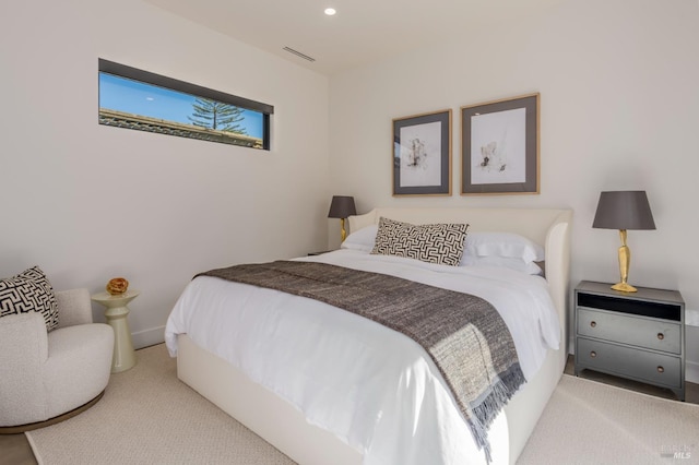 bedroom with visible vents and recessed lighting