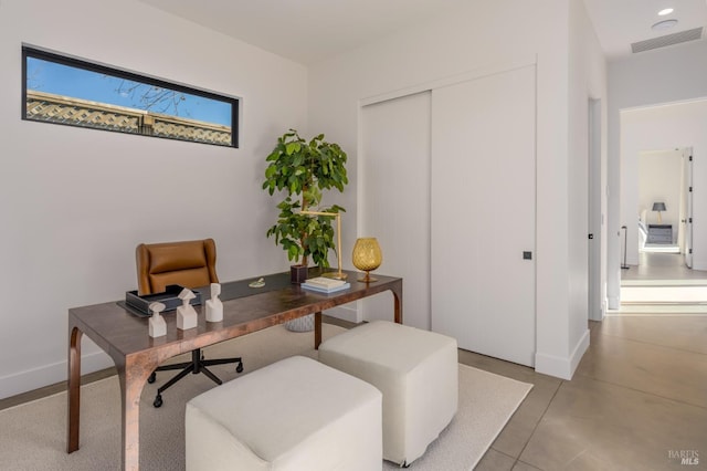 office featuring recessed lighting, visible vents, and baseboards