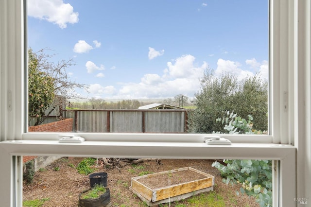 exterior details with a vegetable garden