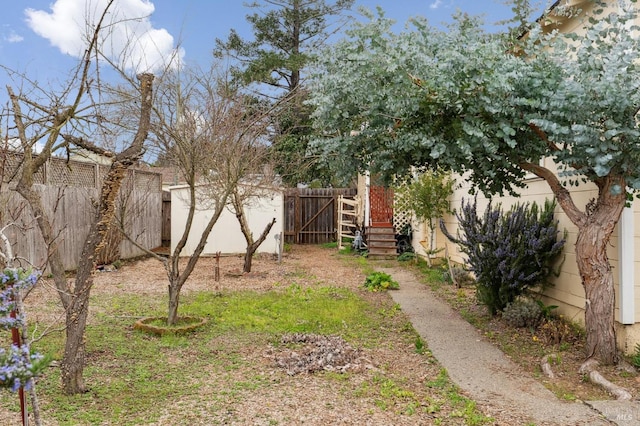 view of yard featuring fence private yard