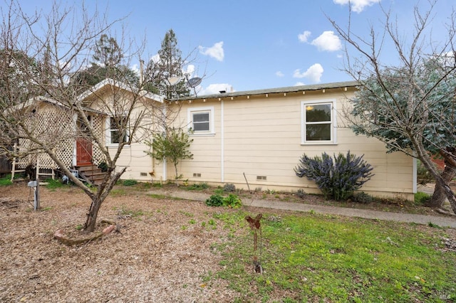 view of front of house featuring crawl space