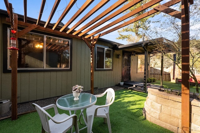 view of patio with fence and a pergola