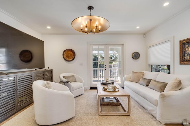 living area featuring carpet, crown molding, french doors, a chandelier, and recessed lighting