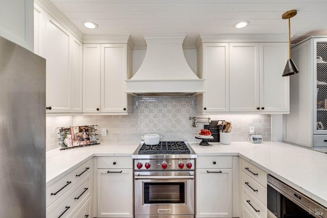 kitchen with recessed lighting, stainless steel appliances, white cabinetry, custom exhaust hood, and tasteful backsplash