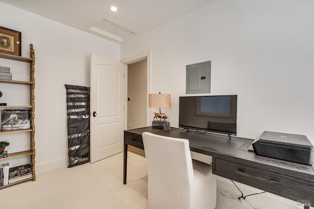 office featuring recessed lighting, electric panel, and light carpet