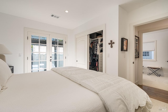 bedroom with visible vents, access to exterior, french doors, a closet, and recessed lighting