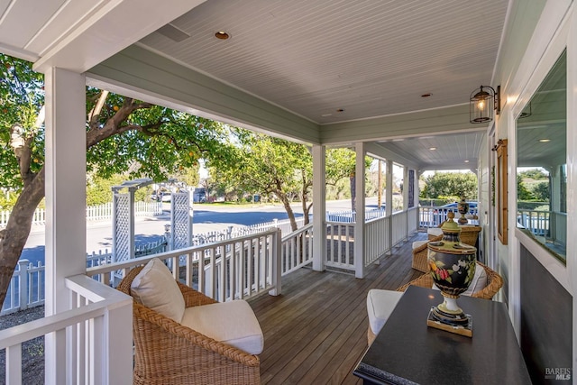 wooden terrace with covered porch