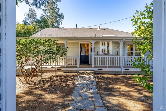 ranch-style house featuring covered porch