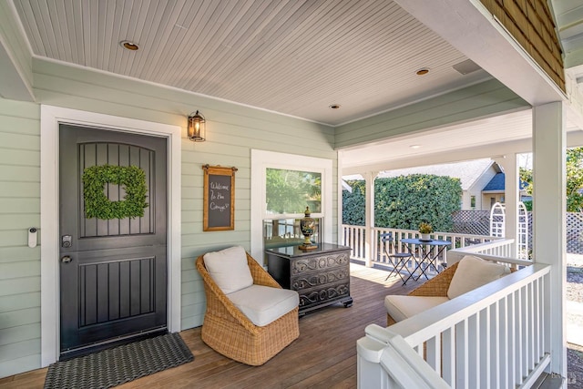 wooden deck featuring a porch