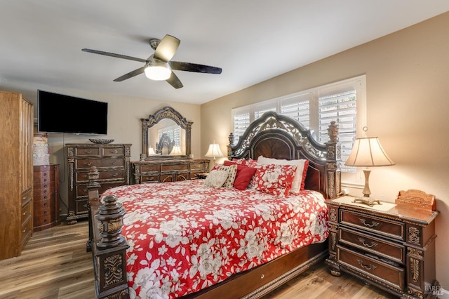 bedroom featuring ceiling fan and wood finished floors