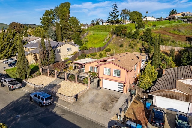 birds eye view of property with a residential view