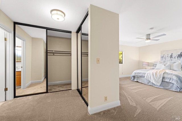 unfurnished bedroom featuring baseboards and light colored carpet