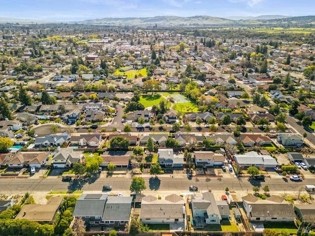 bird's eye view featuring a residential view and a mountain view