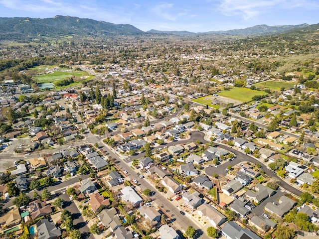 bird's eye view with a residential view and a mountain view