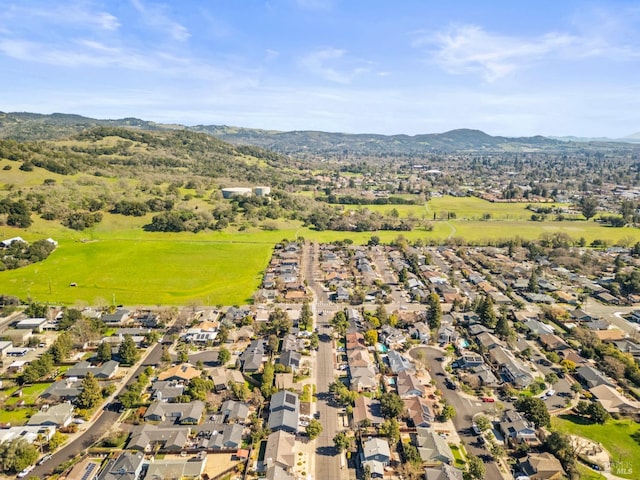 bird's eye view with a residential view and a mountain view