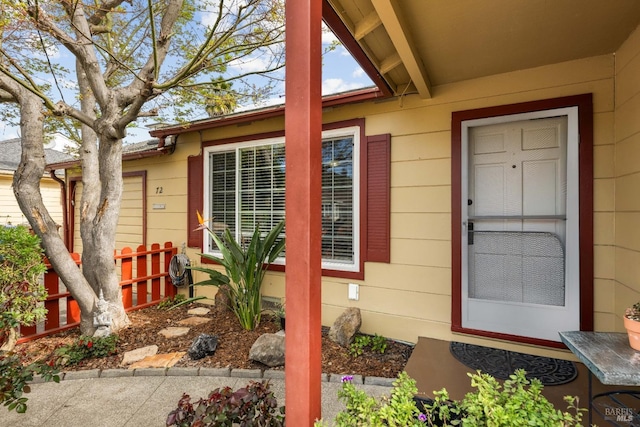 property entrance featuring fence