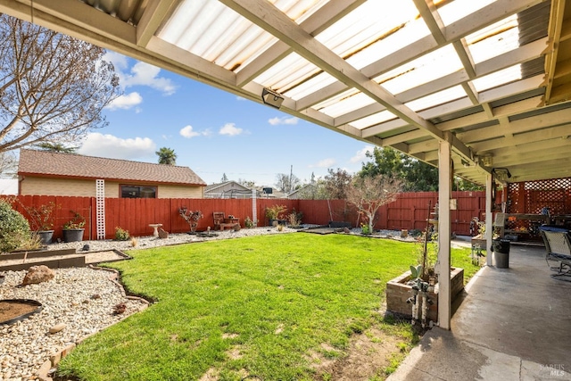 view of yard with a fenced backyard and a patio area