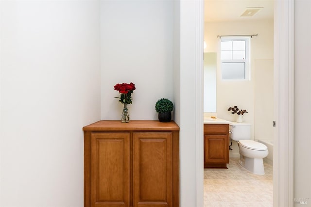 full bath featuring toilet, visible vents, shower / bathing tub combination, and vanity