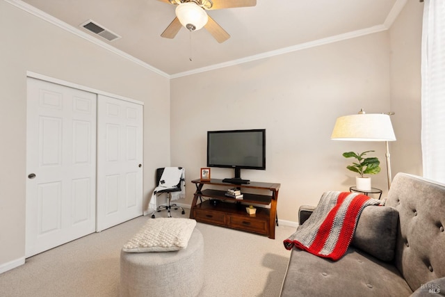 carpeted living area featuring a ceiling fan, baseboards, visible vents, and crown molding