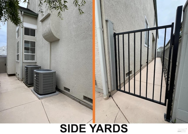 view of patio featuring cooling unit, a gate, and fence