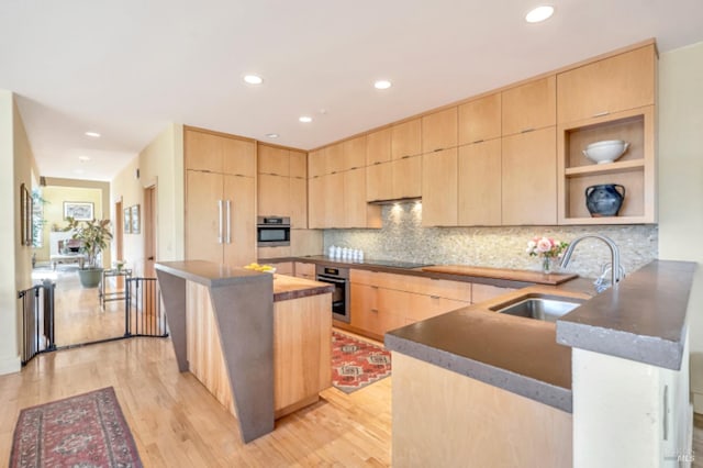 7 Highland Ave, San Rafael, CA 94901 - kitchen featuring a peninsula, stainless steel oven, a sink, and light brown cabinets