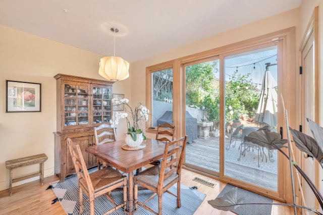 7 Highland Ave, San Rafael, CA 94901 - dining area with baseboards, visible vents, and light wood-type flooring