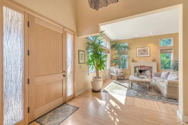 7 Highland Ave, San Rafael, CA 94901 - entrance foyer featuring a high end fireplace, baseboards, and wood finished floors