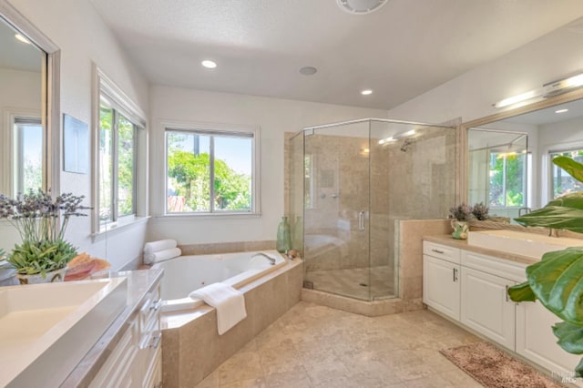 7 Highland Ave, San Rafael, CA 94901 - bathroom featuring a shower stall, recessed lighting, a jetted tub, and two vanities