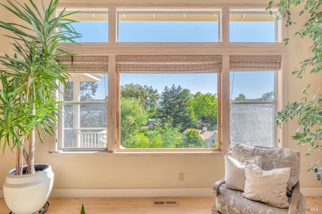 7 Highland Ave, San Rafael, CA 94901 - sitting room with baseboards, visible vents, a healthy amount of sunlight, and wood finished floors