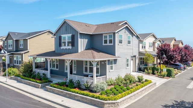 1623 Winterberry Ln, Rohnert Park, CA 94928 - view of front of property featuring board and batten siding, a residential view, and a porch