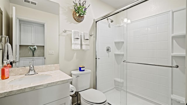 1623 Winterberry Ln, Rohnert Park, CA 94928 - bathroom featuring a stall shower, toilet, and vanity
