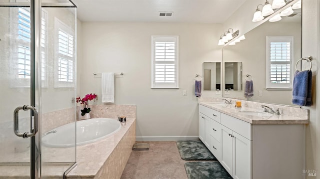1623 Winterberry Ln, Rohnert Park, CA 94928 - full bath featuring a garden tub, double vanity, baseboards, and an enclosed shower