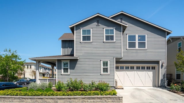 1623 Winterberry Ln, Rohnert Park, CA 94928 - view of front of property with an attached garage, board and batten siding, and driveway