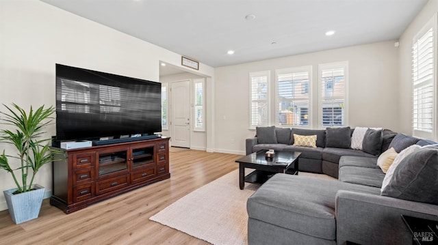 1623 Winterberry Ln, Rohnert Park, CA 94928 - living room with light wood finished floors, plenty of natural light, recessed lighting, and baseboards